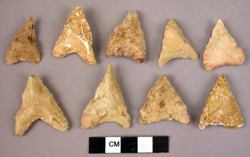 9 triangular, concave flint base arrowheads