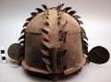 Metal helmet - formerly worn at war, later part of feast day costume