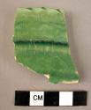 Rim potsherd - green glaze