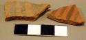 Sherds from pottery bowl made in a basket - black-on-white painted decoration in