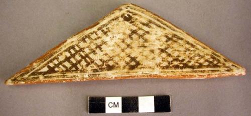 Triangular pottery tile