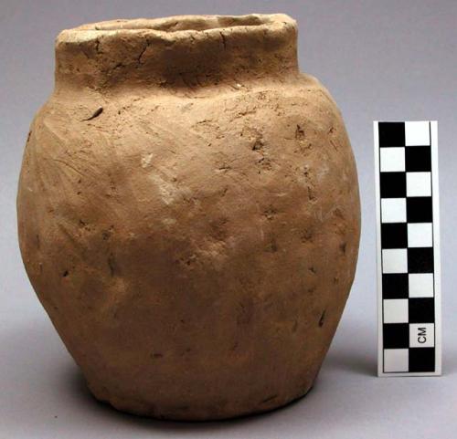 Pottery jar in process of construction, third stage