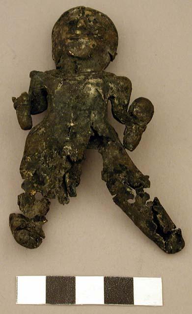 Metal, human figurine, deteriorated