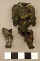 Metal, human figurine, deteriorated, on leg separated