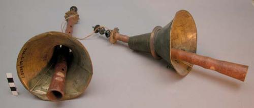 Trumpets (2), Tibetan; wood and brass.