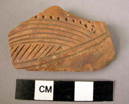 Potsherd - red-brown, incised