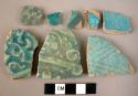 12 potsherds - turquoise blue, faience body