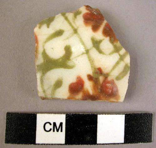 Potsherd - olive green and red on white glaze