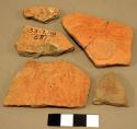 Black-on-red potsherds