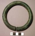Bronze bracelet - unjoined, ornamented with geometric designs,typical