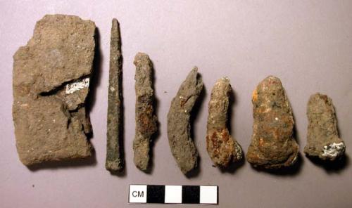 Metal, iron nail fragments, some cut or wrought, some with copper staining; unidentified iron fragments