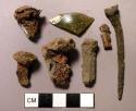 Metal, iron nail fragments, some cut or wrought; unidentified iron and copper alloy fragments; olive green bottle glass fragment