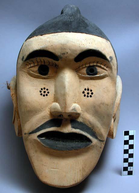 Clown's mask ("kokoboule"); black and yellow, used by jesters on on the margins