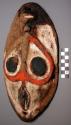 Wooden mask with red, white and black paint - damaged