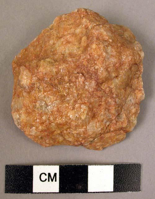 Small disc-shaped quartzite flake implement - apparently unused