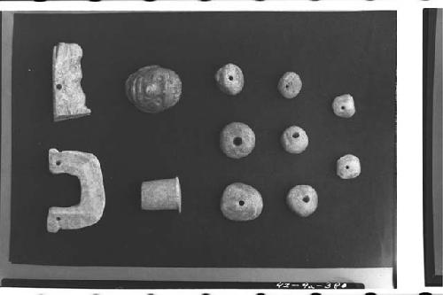 Jades and blue stone figurines; Mound B, Tomb V