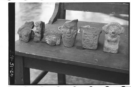 Pottery figurines and feet. Two on right of Tiquisate ware