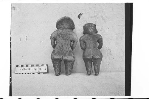 Two Standing, Solid Pottery Figurines