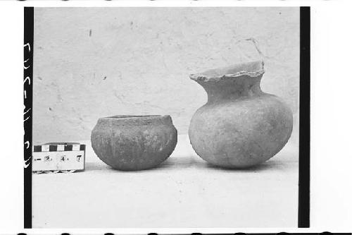 Two Small Plain Buff Pottery Vessels