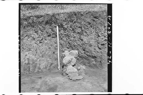 Cairn over burial after excavation of surrounding debris.