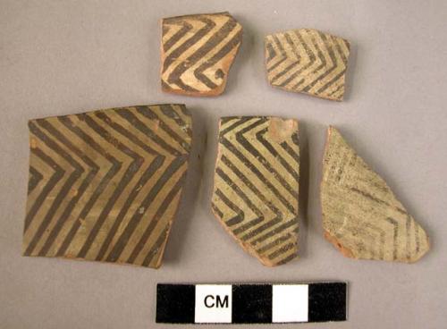 6 rim potsherds - painted on light (B4)