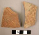 2 potsherds - red, stamped