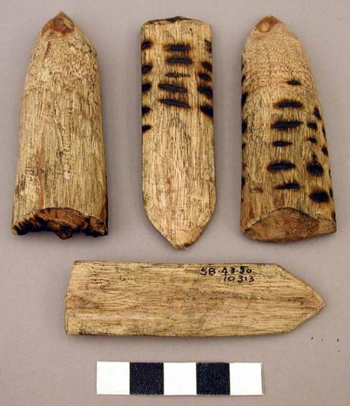 Oracle device - 4 three inch pointed pieces of wood with burned markings