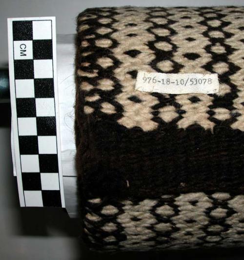 Saddle blanket, diamond twill. Black and white small diamond pattern.