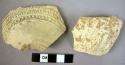 2 potsherds- moulded ware