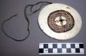 Shell disc worn as head or breast ornament