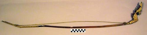 Theatrical bow of buffalo horn, decorated at one end, horn comes from buffalo with albinism