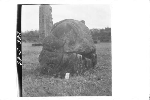 Stone figure (head missing) deliniated upon a boulder (Back & Left side)