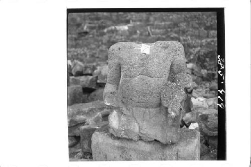 Torso waist and arms of human stone figure