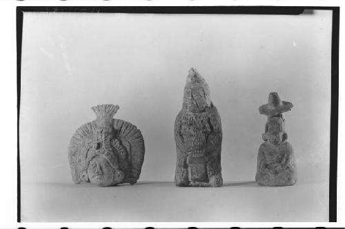(Left) Clay figurine head - (center) figurine clay whistle - quilted type with b