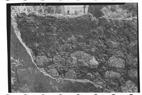 Fingerprints found on exterior of wall when plaster fell off