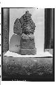 Pottery figurine; bearded (artificial) head with superimposed masks