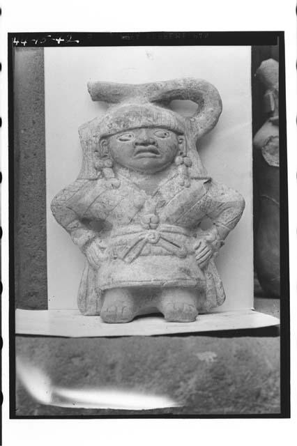 Pottery figurine; hands on hips