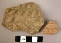 2 potsherds - red, moulded relief