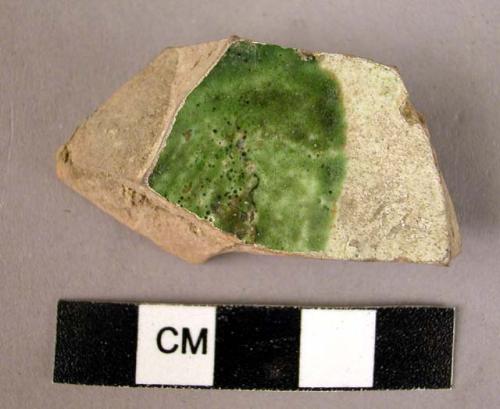 Base potsherd- green and cream glaze