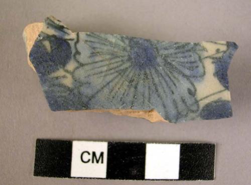 Base potsherd - black and blue glaze on white