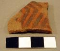 6 black-on-white potsherds, 1 black-on-red, 8 corrugated, and 3 undecorated
