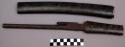 Flintlock gun in wood casing; Knife in wood sheath