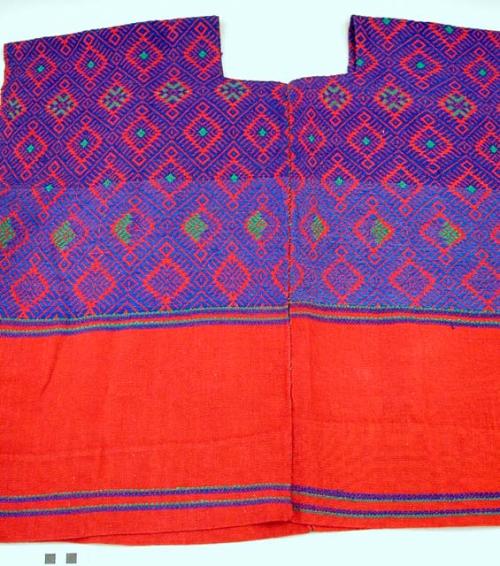 Red huipil with brocade