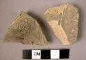 2 potsherds - gray ware, incised