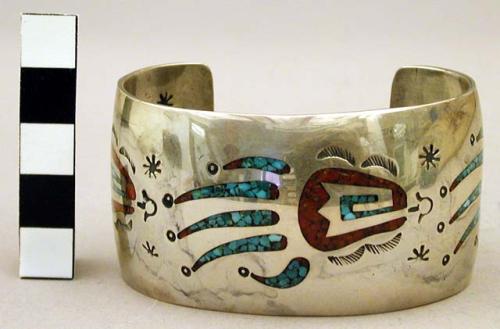 Cuff bracelet, silver band inlaid w/ bear claw designs made of diff. materials