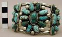 Bracelet, silver with 25 turquoise stones, central cluster is floral type design