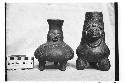 2 incised effigy jars, conceivably fakes. Black surfaces.