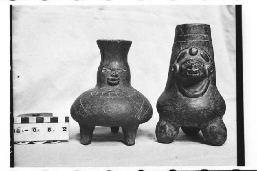 2 incised effigy jars, conceivably fakes. Black surfaces.