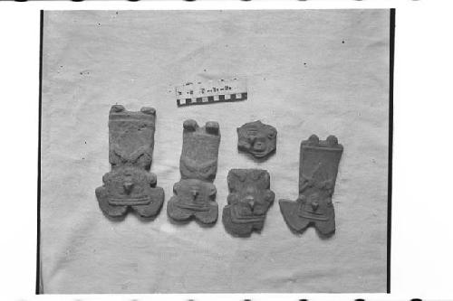 Four Flat Pottery Figurines and Fragments