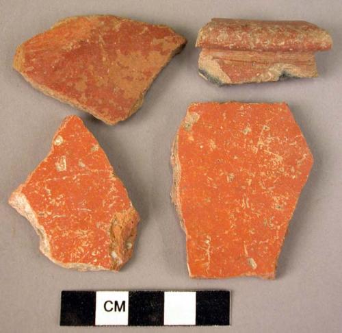 4 potsherds - bright shiny red surface outside, dull light red inside